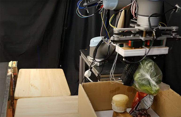 The RoboGrocery system combines vision, algorithms, and soft grippers to prioritize items to pack.